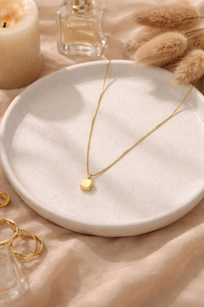 Elegant Gold Cube Pendant