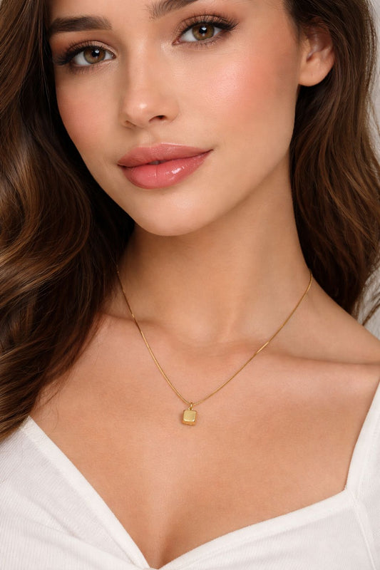 Elegant Gold Cube Pendant