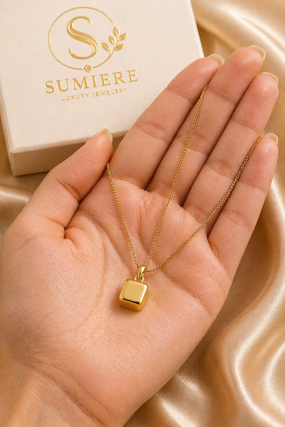 Elegant Gold Cube Pendant
